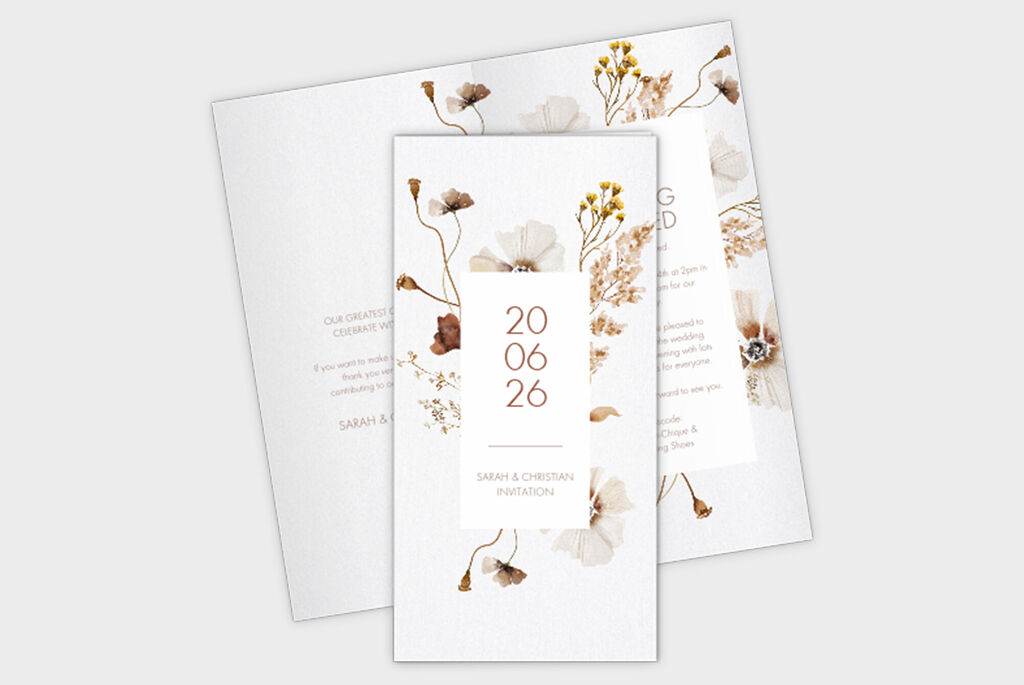 En stilren bröllopskort-design med känsliga blommor och datumet 24.06.23.